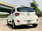 Bán xe Hyundai Grand i10 sản xuất 2015, màu trắng, nhập khẩu 