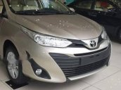 Cần bán xe Toyota Vios E CVT 2018, màu vàng