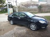 Cần bán lại xe Toyota Corolla altis đời 2005, màu đen, 313tr