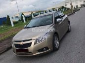 Cần bán gấp xe Chevrolet Cruze đời 2011 số sàn,màu vàng cát