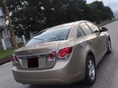 Cần bán gấp xe Chevrolet Cruze đời 2011 số sàn,màu vàng cát