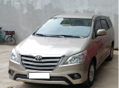 Cần bán xe Toyota Innova E đời 2014, màu kem (be)