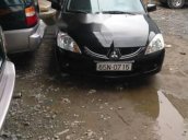 Cần bán lại xe Mitsubishi Lancer 2003, màu đen