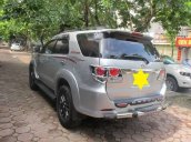 Bán xe Toyota Fortuner 2.7V đời 2016, màu bạc số tự động, 925 triệu