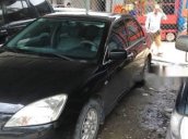 Cần bán lại xe Mitsubishi Lancer 2003, màu đen