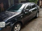 Cần bán Chevrolet Lacetti SE đời 2004, màu đen, giá 115tr