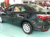 Cần bán xe Toyota Corolla Altis 1.8 E CVT năm 2018, màu đen, 707 triệu