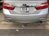 Cần bán lại xe Toyota Camry 2.0E AT đời 2013, màu bạc  