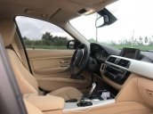 Bán xe BMW 320i năm 2017, màu đen như mới