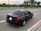 Bán xe BMW 320i năm 2017, màu đen như mới