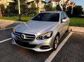 Cần bán xe Mercedes E250 Sx và đăng kí 2014, màu bạc, nội thất đen, xe đi được 65000km