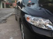 Cần bán Toyota Corolla altis đời 2009, màu đen, số sàn