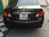 Cần bán Toyota Corolla altis đời 2009, màu đen, số sàn