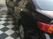 Cần bán Toyota Corolla altis đời 2009, màu đen, số sàn