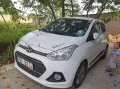 Cần bán Hyundai Grand i10 đời 2014, màu trắng số tự động