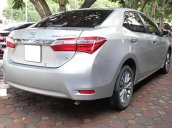 Cần bán xe Toyota Corolla altis 1.8G AT 2015, màu bạc 