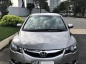 Cần bán Honda Civic 1.8AT đời 2010, màu bạc số tự động