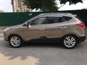 Bán ô tô Hyundai Tucson 2.0 AT 4WD đời 2011, màu vàng, nhập khẩu xe gia đình, giá 595tr