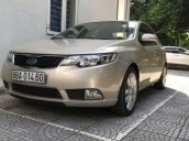 Chính chủ bán Kia Forte 1.6 MT 2011, màu vàng cát