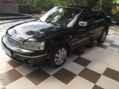 Cần bán gấp Ford Laser 1.8AT năm sản xuất 2003, màu đen chính chủ