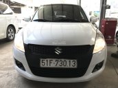 Bán Suzuki Swift 1.4AT màu trắng camay, số tự động, biển Sài Gòn, sản xuất cuối 2016, chạy đúng 13000km