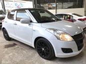 Bán Suzuki Swift 1.4AT màu trắng camay, số tự động, biển Sài Gòn, sản xuất cuối 2016, chạy đúng 13000km