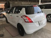 Bán Suzuki Swift 1.4AT màu trắng camay, số tự động, biển Sài Gòn, sản xuất cuối 2016, chạy đúng 13000km