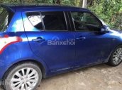 Bán gấp ô tô Suzuki Swift đời 2014, màu xanh lam