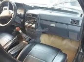 Bán Mazda 323 1990, màu đen, xe đang đi lại bình thường