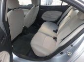 Cần bán xe Mitsubishi Attrage năm 2015, màu bạc xe gia đình