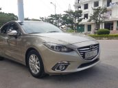 Cần bán xe Mazda 3 1.5AT, màu vàng 2015, giá 595tr