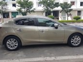 Cần bán xe Mazda 3 1.5AT, màu vàng 2015, giá 595tr