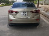 Cần bán xe Mazda 3 1.5AT, màu vàng 2015, giá 595tr