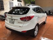 Cần bán Hyundai Tucson sản xuất 2011, màu trắng, xe nhập