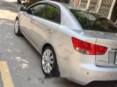 Cần bán gấp Kia Forte sản xuất 2011, màu bạc 
