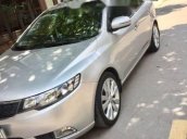 Cần bán gấp Kia Forte sản xuất 2011, màu bạc 
