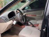 Cần bán Toyota Camry đời 2003, màu đen, giá tốt