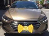 Bán xe Hyundai Elantra 1.6 MT năm sản xuất 2016, màu vàng 