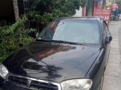 Cần bán Kia Spectra màu đen, đời 2005, xe gia đình bảo quản rất cẩn thận