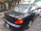 Cần bán Kia Spectra sản xuất năm 2003, màu đen, xe đẹp