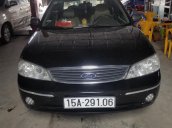 Bán Ford Laser sản xuất 2004, màu đen số tự động, máy zin nguyên bản