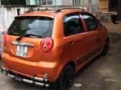 Chính chủ bán ô tô Chevrolet Spark đời 2009, màu cam