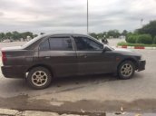 Cần bán xe Mitsubishi Lancer 1.6 MT năm 2003, màu vàng chính chủ