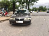 Cần bán xe Mitsubishi Lancer 1.6 MT năm 2003, màu vàng chính chủ