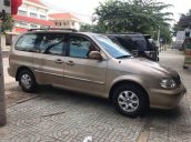 Cần bán Kia Carnival 2009, màu nâu số tự động, 245tr