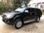 Bán Toyota Hilux 2.5E đời 2014, màu đen, 495tr