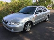 Cần bán gấp Mazda 626 sản xuất năm 2004, màu bạc số sàn