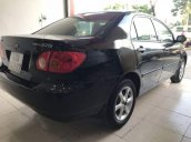 Cần bán xe Toyota Corolla Altis 1.8G MT đời 2002, màu đen, chạy cực đầm