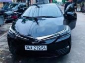 Cần bán xe Toyota Corolla altis 1.8E AT 2017, màu đen số tự động