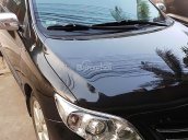 Bán Toyota Corolla Altis 1.8G MT đời 2011, màu đen, xe đẹp